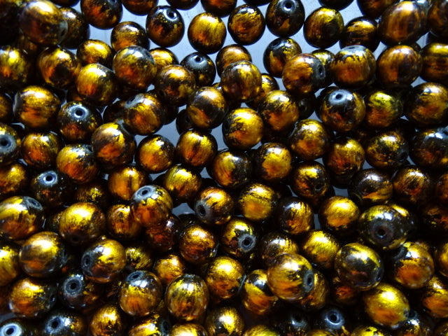 'Old Gold on Black'  10mm Glass Beads