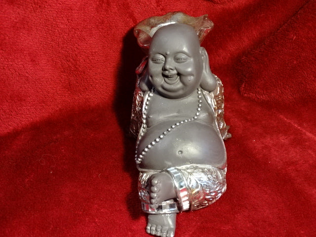 Reclining buddha tea-light holder