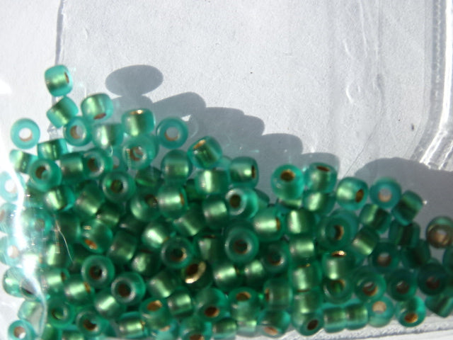 Matubo Seed beads size 8. Matte Emerald- Bronze Ice Lined
