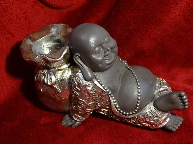 Reclining buddha tea-light holder