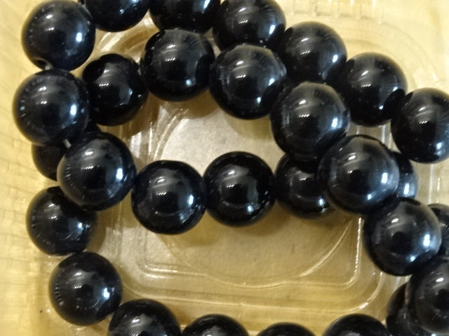 'Plain and Perfect' pure black 12mm glass beads