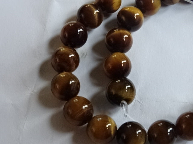 Beautiful genuine polished tigers eye beads 8mm