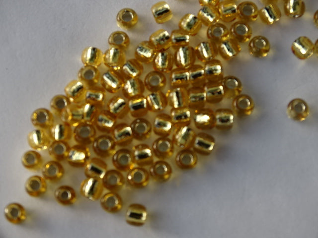 Toho Size 6 Silver Lined Topaz