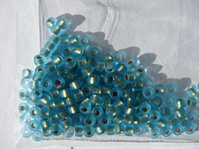 Matubo Seed beads size 8. Matte Aquamarine- Bronze Ice Lined